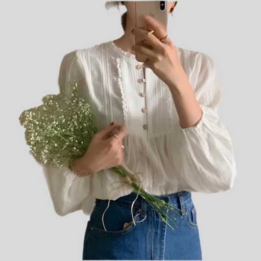 Blusa de encaje blanca de manga larga 